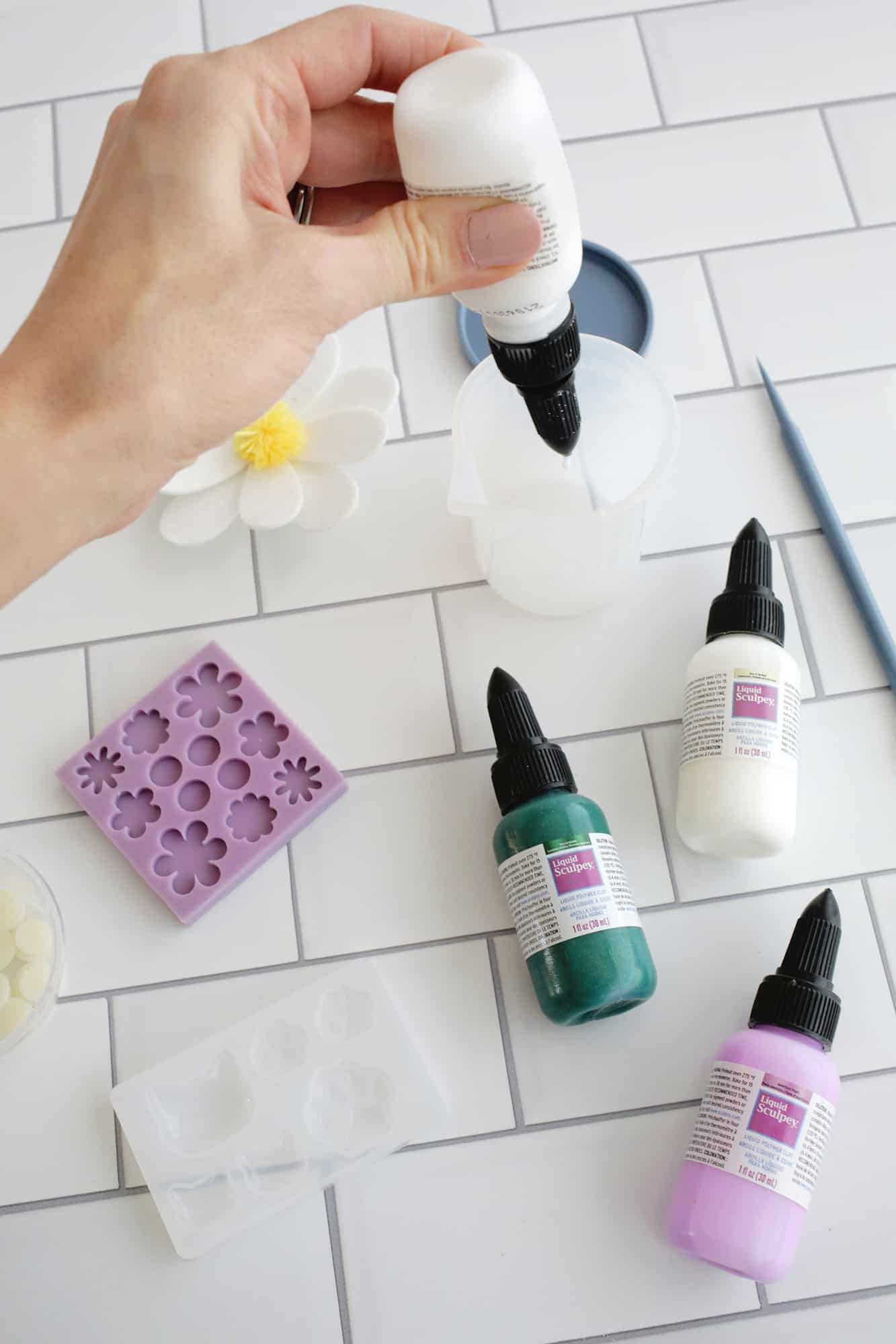 pouring liquid sculpey into cup